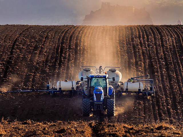 For 27 years, Kinze has sold products in 35 countries. It recently opened an assembly plant in Lithuania. This planter works a field in Slovakia. (Progressive Farmer image provided by Kinze Mfg.)